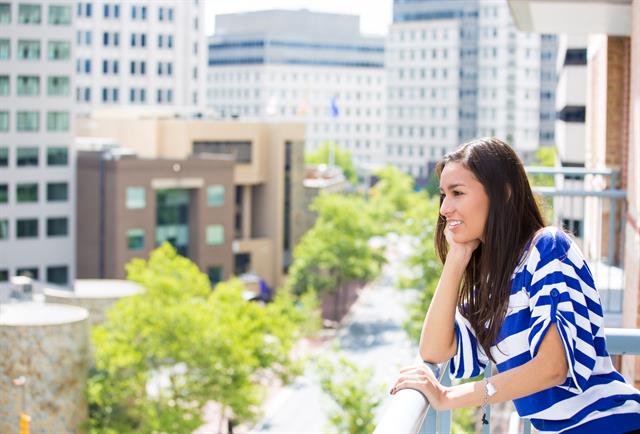 Girl looking on balcony